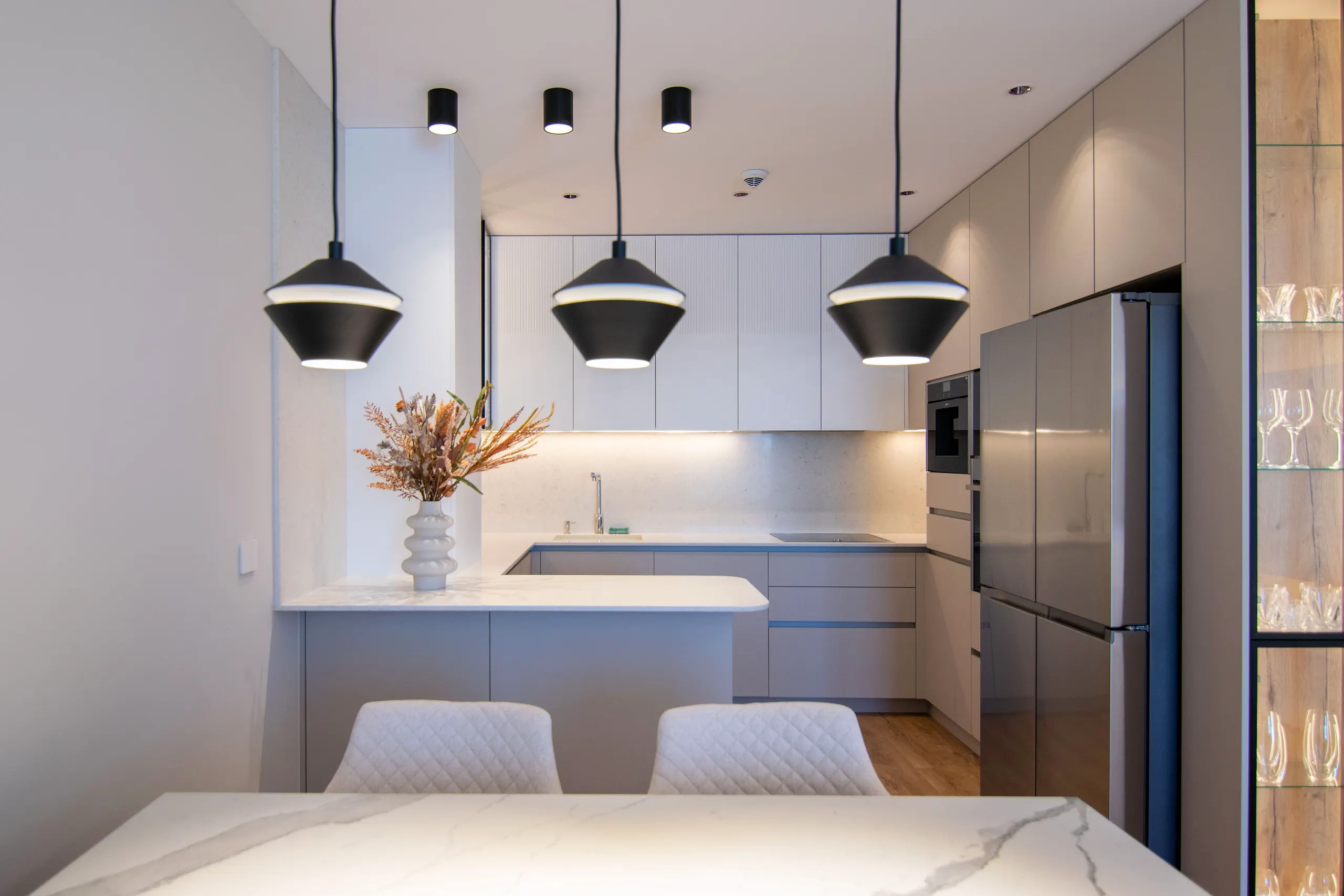 Apartment designed for a young family, defined by a light and airy palette with a contemporary character.